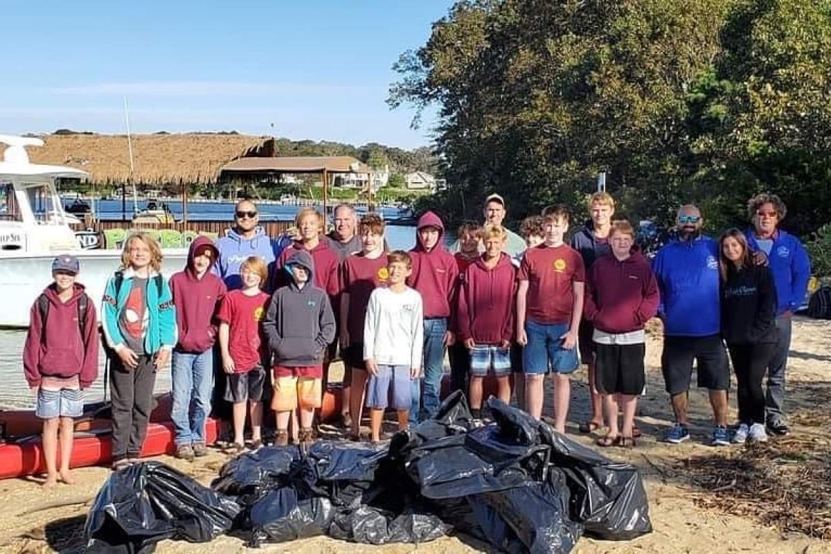 Scout Clean-up Crew and garbage bags on Nienstedt Island